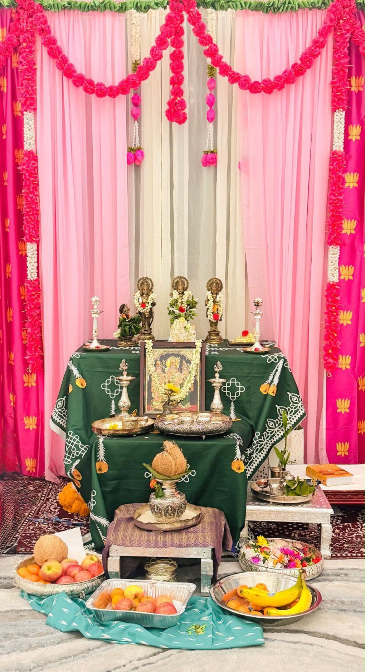Traditional pooja decoration with marigold garlands by Shubham Events, Leander TX